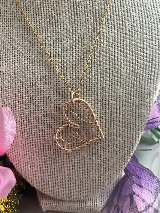 Handmade heart pendant necklace.