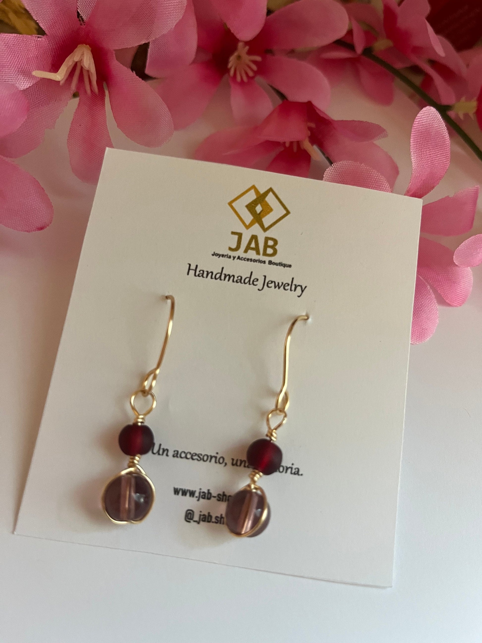 Beautiful dark red earrings.