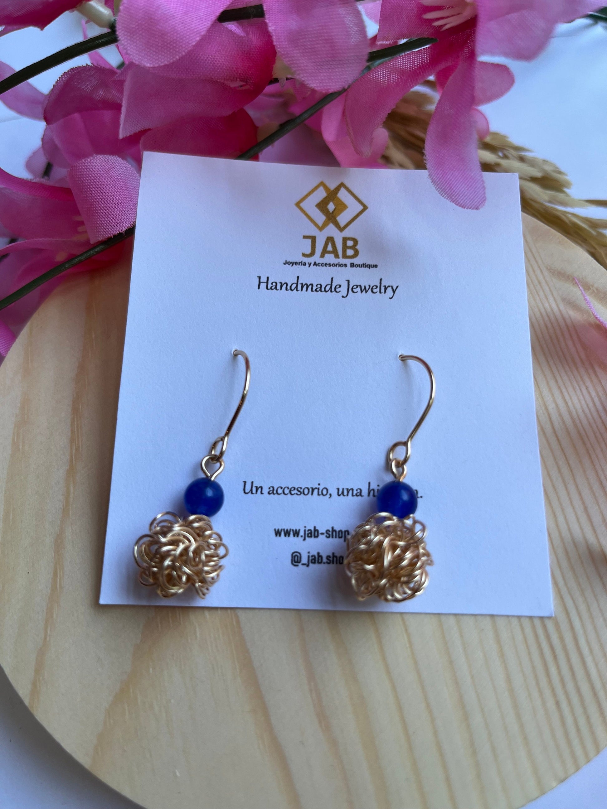 Fireball earrings in hypoallergenic wire.