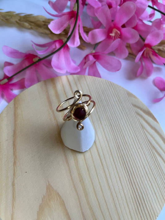 Adjustable ring with Dark Red Crystal.